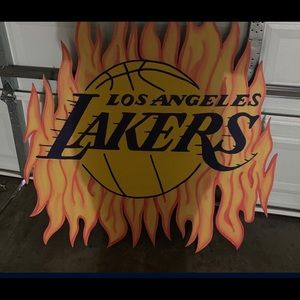 An lakers sign big yellow orange and purple can hang it up on wall